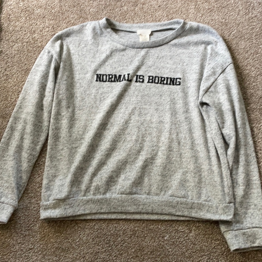Grey long sleeved